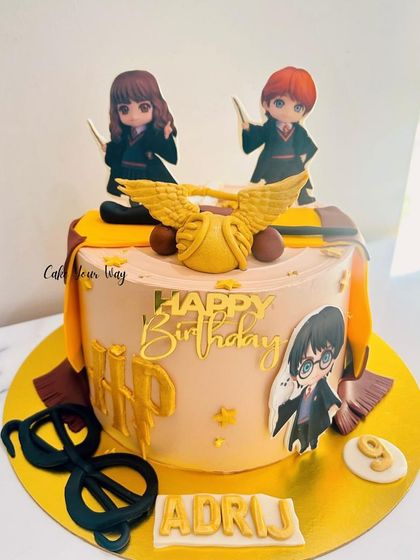 Straight out of Hogwarts. A magical Harry Potter cake for a little wizard turning 9, complete with a golden snitch.