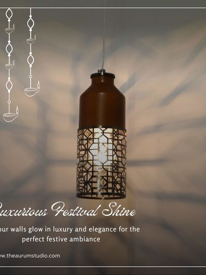 This hanging light with a patterned metal shade creates a luxurious festival shine. The intricate design casts beautiful shadows, adding elegance to the festive ambiance.