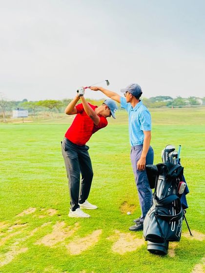 Our coaches are constantly on the range, providing hands-on instruction. From demonstrating a swing path to analyzing a student's setup, these moments of direct mentorship are where real progress is made.