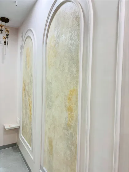 A side angle showing the depth and texture of the finished wall panels.