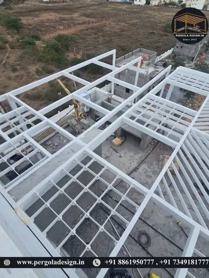 Another angle of the large-scale white pergola fabrication, showing the different patterns and sections coming together.