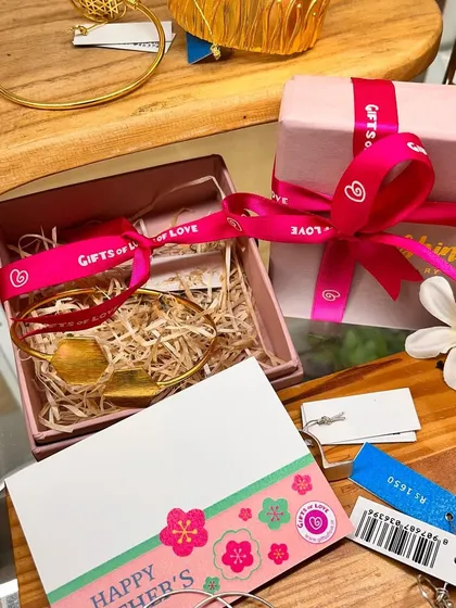 Loveable gifts for the most loveable person we know. A beautiful bracelet being packed for Mother's Day.