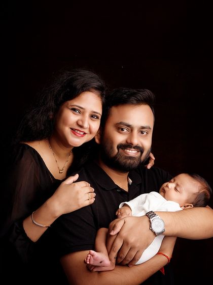 Cradled in love, wrapped in warmth. The first family portrait with a newborn is a once-in-a-lifetime moment, and I am honored to capture it.