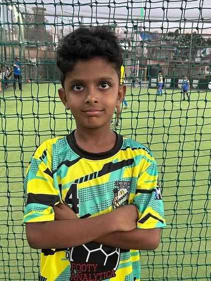 A young player looking focused and ready for his match in the MCFC Grassroots League. We instill a professional mindset from an early age.