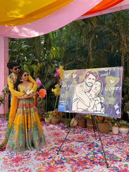 Making a wedding truly unforgettable. I help couples create interactive art stations where guests can add their own splash of color to a portrait of the happy couple. It becomes a beautiful, co-created memory from their special day.