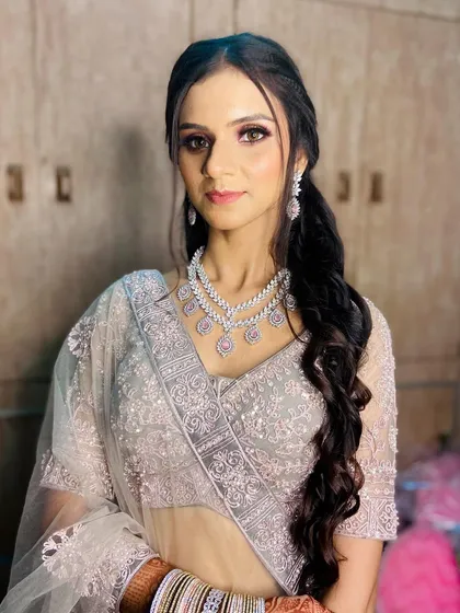 Another angle of the engagement look, showing how the makeup looks from the side and highlighting the elegant hairstyle.