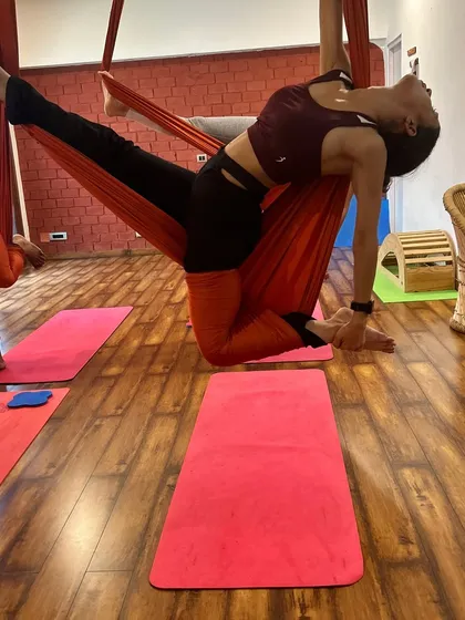 This aerial pose is an endurance workout that builds strength, improves balance, and brings a sense of calmness and focus.