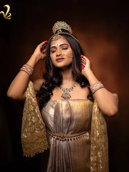 A powerful pose as Shailaputri, adjusting her crown. This is a metaphor for women adjusting to their own power and embracing their inner strength with grace.
