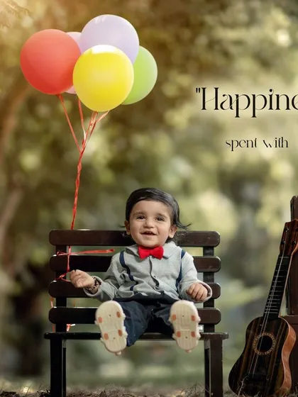 Happiness is a day spent with you. This joyful outdoor first birthday portrait with colorful balloons is full of life and energy.