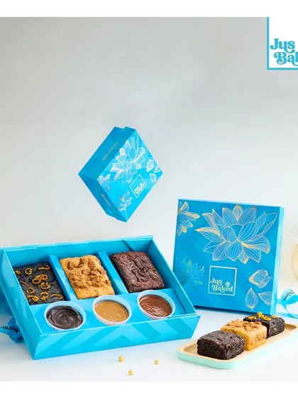 The 'Tea Party Pack' is perfect for Diwali gatherings. It comes with an assortment of brownies and delicious dips, all packed in our signature blue festive box.