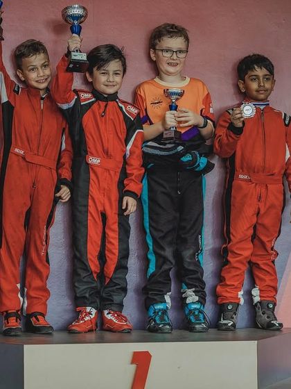 The micro-max podium at the Rok Cup in Singapore. We are incredibly proud of our youngest driver for earning his place among the top competitors.