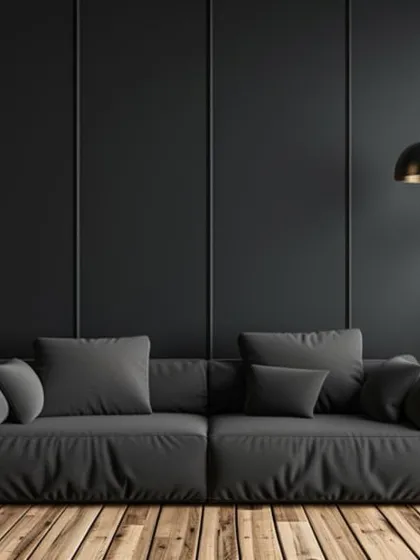 A bold, dark wall can create a dramatic and intimate atmosphere. This moody charcoal, balanced with warm wood flooring and soft textiles, is perfect for a chic cafe or a high-end salon looking for a contemporary feel.