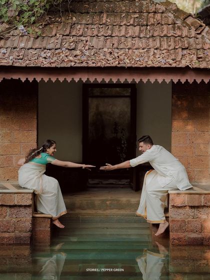 A moment of connection between Jayaram and Abirami, reaching for each other's hands. This shot beautifully symbolizes their journey towards each other.