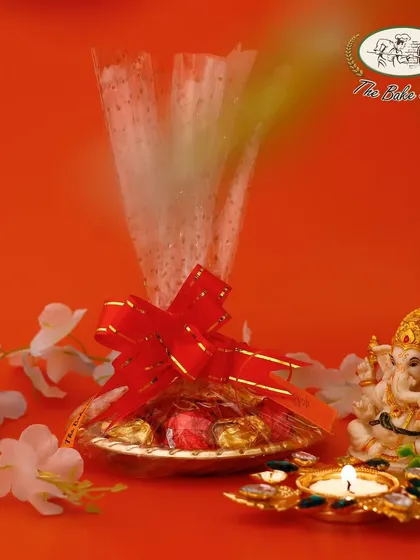 Our assorted chocolate rocks, loaded with cashews and almonds, presented in a festive basket for Diwali.