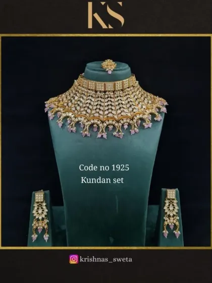 An exclusive Kundan bridal set with a unique design and pastel purple beads. This choker and earring set is perfect for a reception or engagement party.