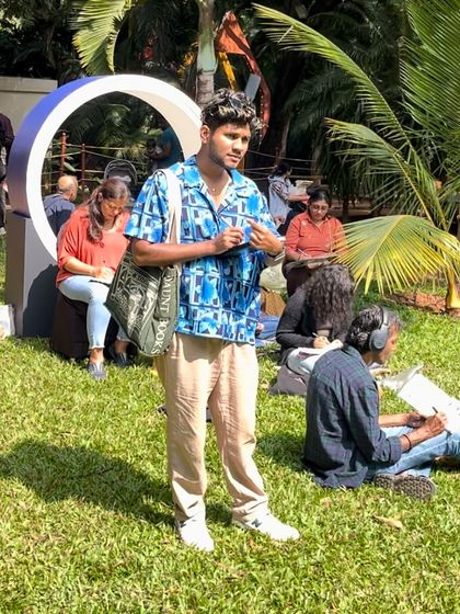 A photo of me at the Bengaluru Literature Festival, where our sketching group gathered.