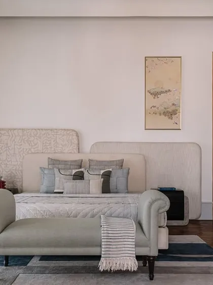 A collection of views from the Rehethaan project, showcasing the daughter's bedroom with its unique glass brick wall, the guest bedroom, and the master bedroom with its layered headboard design.