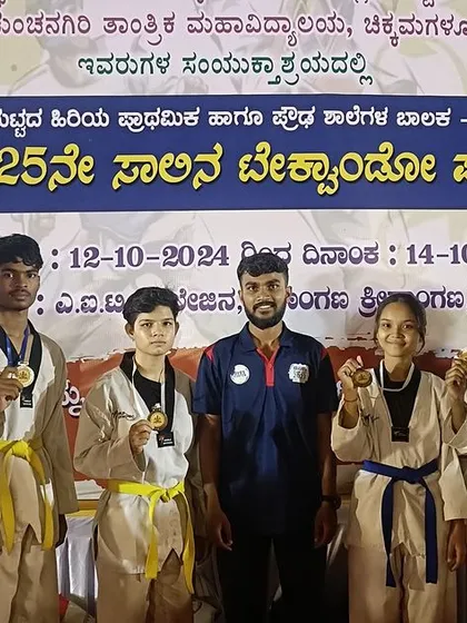 Our coach with a group of our state-level medalists. We stand by our students at every step of their competitive journey.