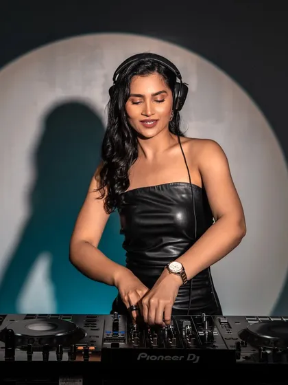 At the decks for the Armani Exchange campaign. This shot combines my love for DJing with high fashion, showcasing the watch in a natural setting.