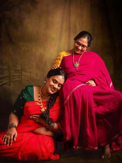 A multi-generational portrait celebrating the bond between a mother and her pregnant daughter. Capturing these family connections during a maternity shoot is incredibly meaningful.