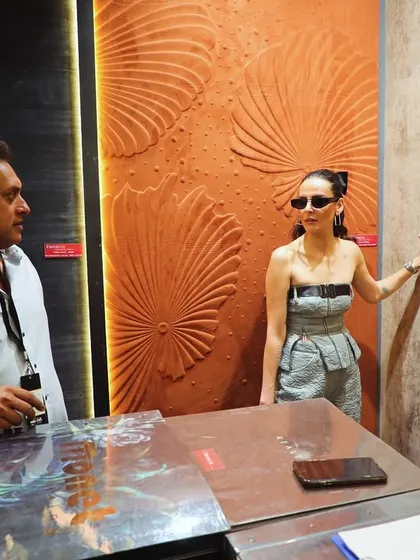 Exploring the tactile qualities of our wallcoverings with Mandana Karimi. The ability to see and touch these materials is key to the luxury experience.
