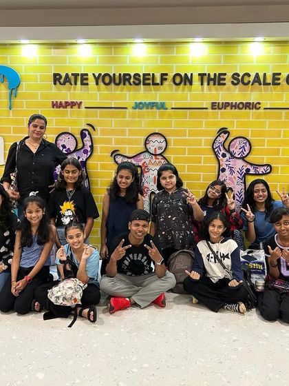 Posing for a group photo during a fun day out at the mall. These outings help strengthen the bond within our TBR family.