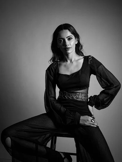 A close-up from the same monochrome series, focusing on the clean lines and soft contouring of the makeup.