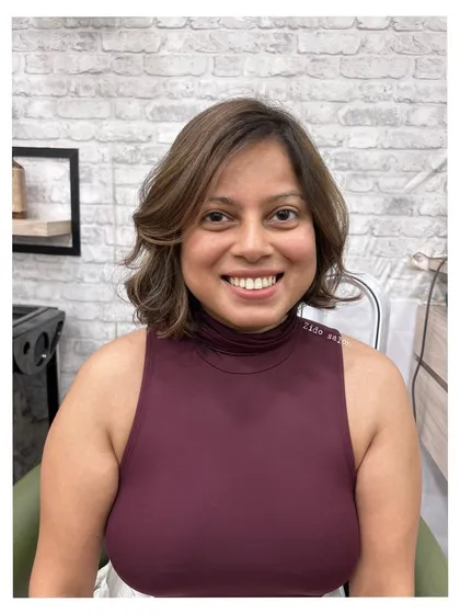 Here you can see how our subtle highlights work beautifully with a shorter, layered bob. The color adds texture and volume, making the haircut look even more dynamic.
