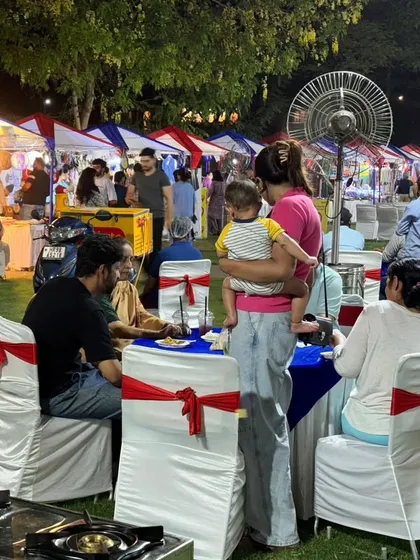 Beyond indoor halls, I also create lively outdoor flea markets. Here's a glimpse of a family-friendly evening event at Heritage City, complete with food, shopping, and a relaxed atmosphere.