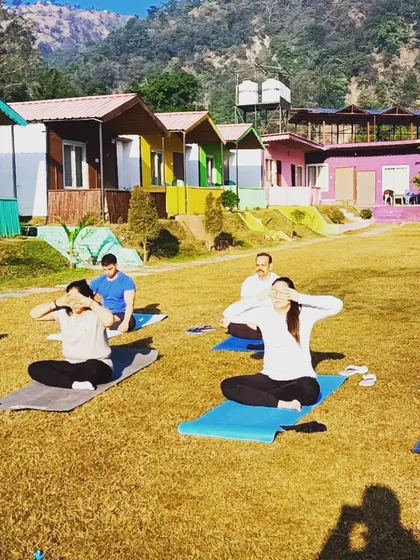 Students practicing Bhramari (Humming Bee Breath) at our Rishikesh retreat. This pranayama is incredibly effective at calming the mind and releasing agitation.