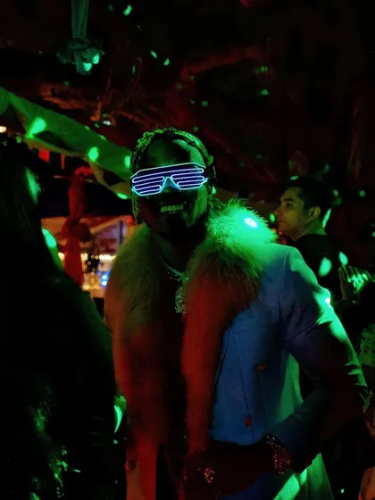 A guest in futuristic LED glasses, adding to the unique vibe of Pebble.
