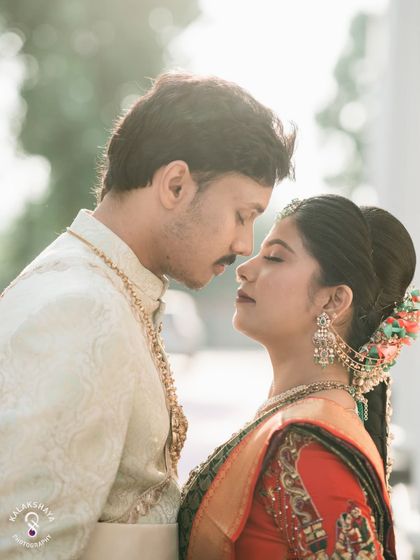 An intimate close-up of the couple, capturing the quiet connection and emotion of the wedding day.