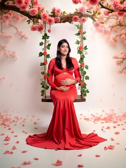 A serene portrait on a floral swing surrounded by falling cherry blossom petals. This setup creates a soft, romantic, and dreamy atmosphere.