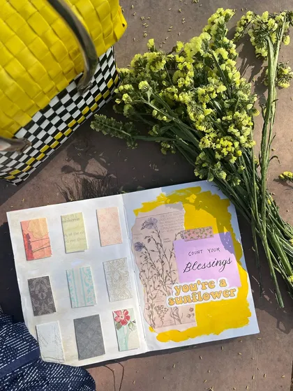 A bright and sunny journal spread with a yellow theme, featuring a reminder to "count your blessings."