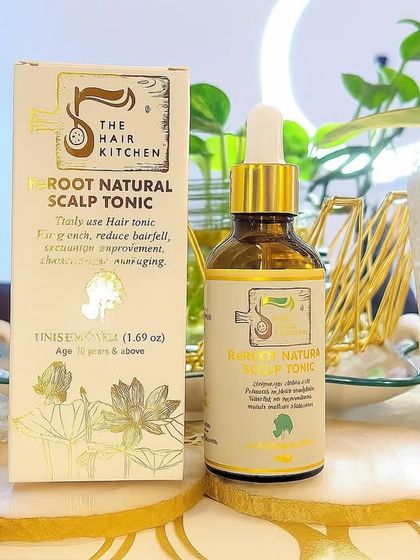 A detailed breakdown of the ReRoot Hair Scalp Tonic. This image explains the benefits of key ingredients like Biotin for strength, Fenugreek for protein, and Jatamansi for growth, highlighting its herbal, science-backed formula.