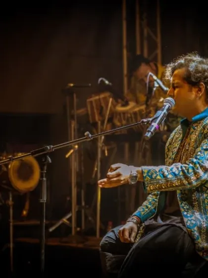 An intimate shot of our lead vocalist, capturing a moment of deep musical expression.