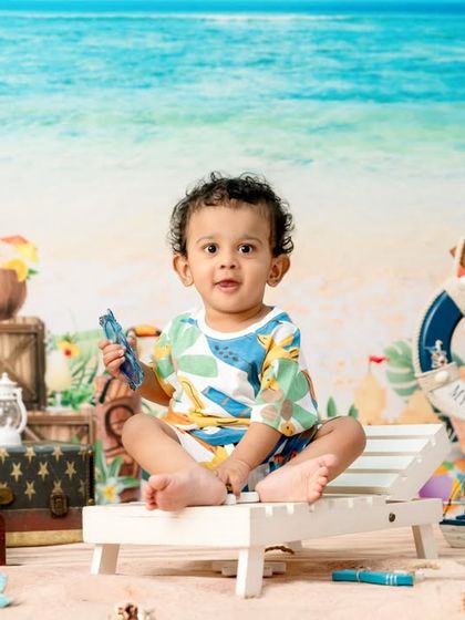 A wider view of the colorful and detailed beach setup, perfect for a summer-themed milestone shoot.