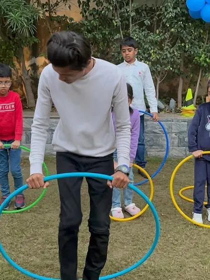 At our Children's Day celebration, we had a blast with hula hoops. An instructor led the kids in fun exercises, showing how simple activities can be a great way to get active and play together.