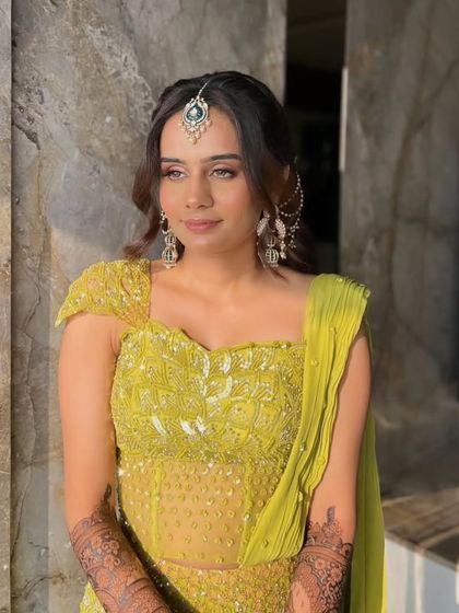 A beautiful portrait of a bride, her mehandi adding to her overall look.