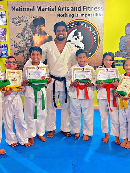 National Martial Arts and Fitness Academy - Kids Martial Arts & Fitness The Journey of Discipline: Belt Graduations photo 46