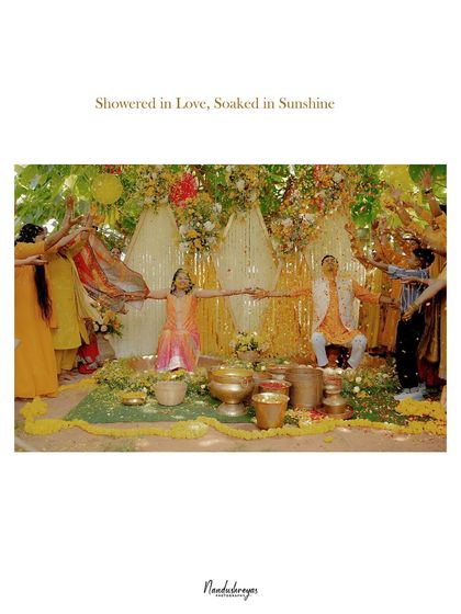 A beautifully designed frame with the caption "Showered in Love, Soaked in Sunshine," capturing the essence of a joyful Haldi ceremony with family.