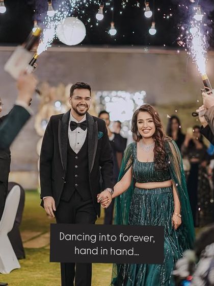 "Dancing into forever, hand in hand." Pragya and Akhil make their grand entrance at their reception, celebrated by friends with sparklers. We love choreographing these high-energy moments.
