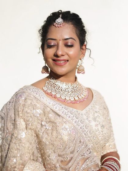 This client looks radiant in a delicate American diamond and pearl choker, rented for her engagement ceremony. It’s subtle, elegant, and photographs beautifully.