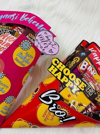 Our fun snack cone hampers for Raksha Bandhan. One is for the 'Pyaari Behen' (dear sister) and the other for the 'Bro', both filled with tasty treats.