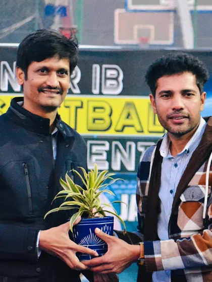 Presenting a token of our appreciation to our esteemed guest, Mr. Mohit Bhandari. We are grateful for his time and his dedication to Indian basketball.