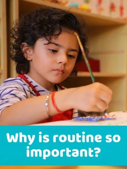 A young girl completely absorbed in her painting. These moments of quiet focus are crucial for developing concentration and a love for creative expression.
