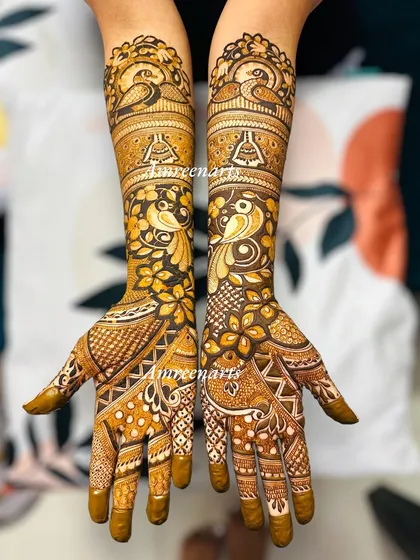This Karvachauth design is filled with graceful peacocks and intricate floral patterns, perfect for celebrating love and tradition.