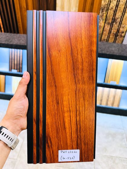 The rich, reddish-brown wood grain fluted panel, showcasing its deep color and realistic texture.