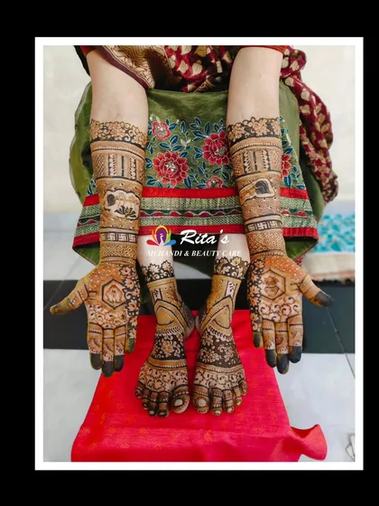 The full mehendi for both the mother and daughter, featuring coordinated designs that symbolize their shared spiritual journey.