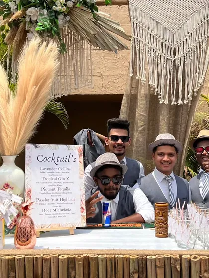 A glimpse of our popular Bohemian-themed bar, perfect for a relaxed sundowner or mehendi. We use natural elements like bamboo, pampas grass, and macrame to create a chic and laid-back vibe.
